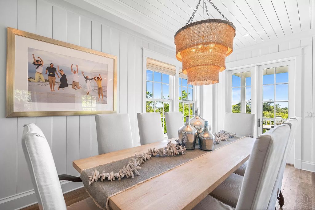 Welcome to an architectural masterpiece by Peter Block, where luxury meets seaside sophistication in this Nantucket-inspired residence.