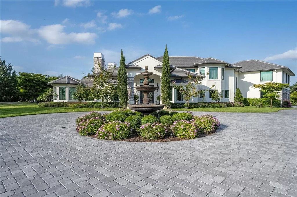 Welcome to this luxurious estate in the prestigious Aero Club. Featuring 7 bedrooms, 8 1/2 bathrooms, and 3 1/2 kitchens, this home is designed for ultimate comfort.