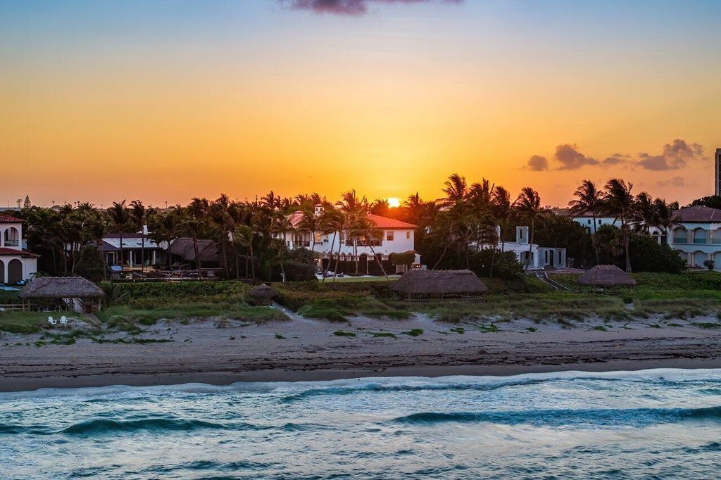 This exquisite estate, built by renowned Dan Swanson, offers breathtaking views of South Florida's coastline.