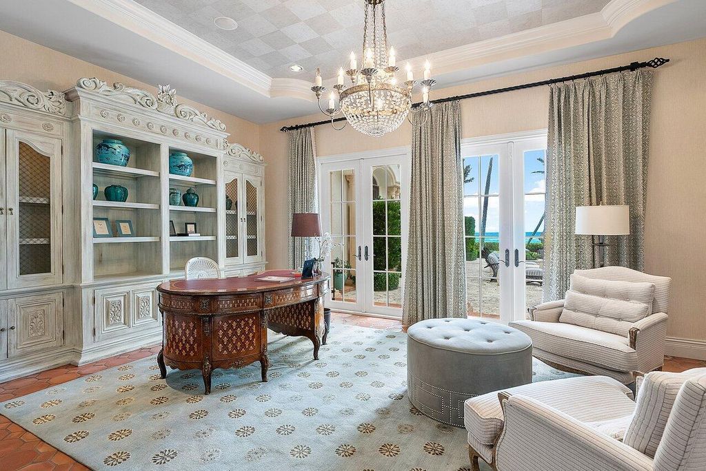 This exquisite estate, built by renowned Dan Swanson, offers breathtaking views of South Florida's coastline.