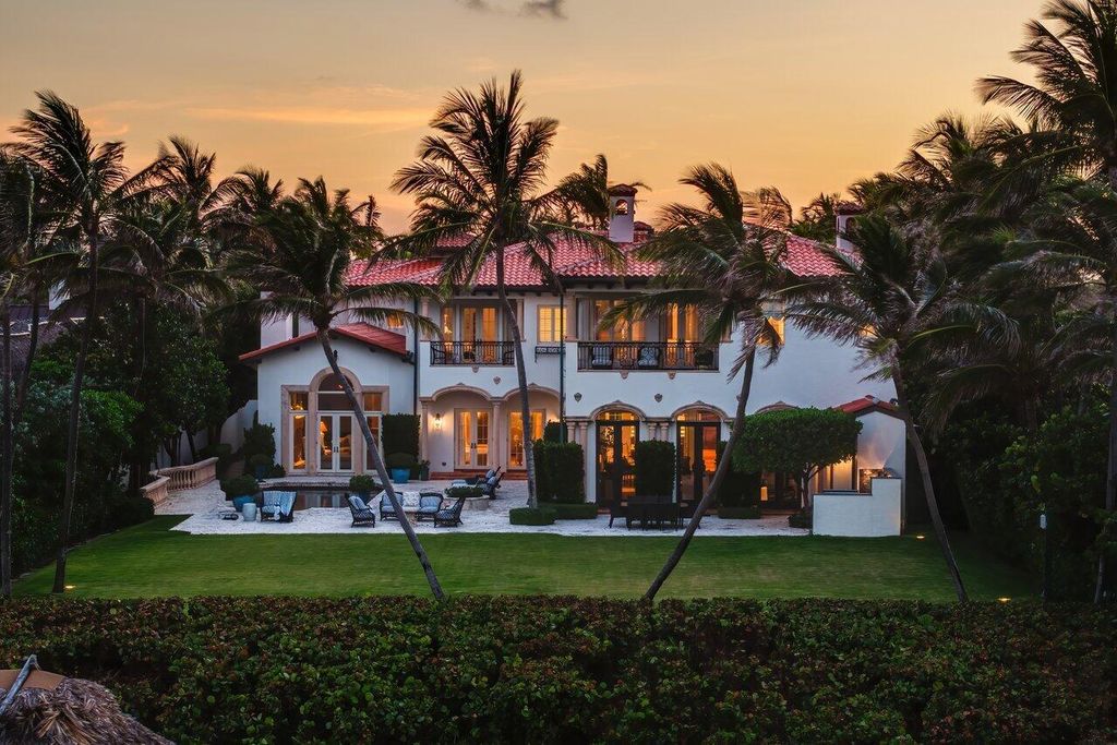 This exquisite estate, built by renowned Dan Swanson, offers breathtaking views of South Florida's coastline.