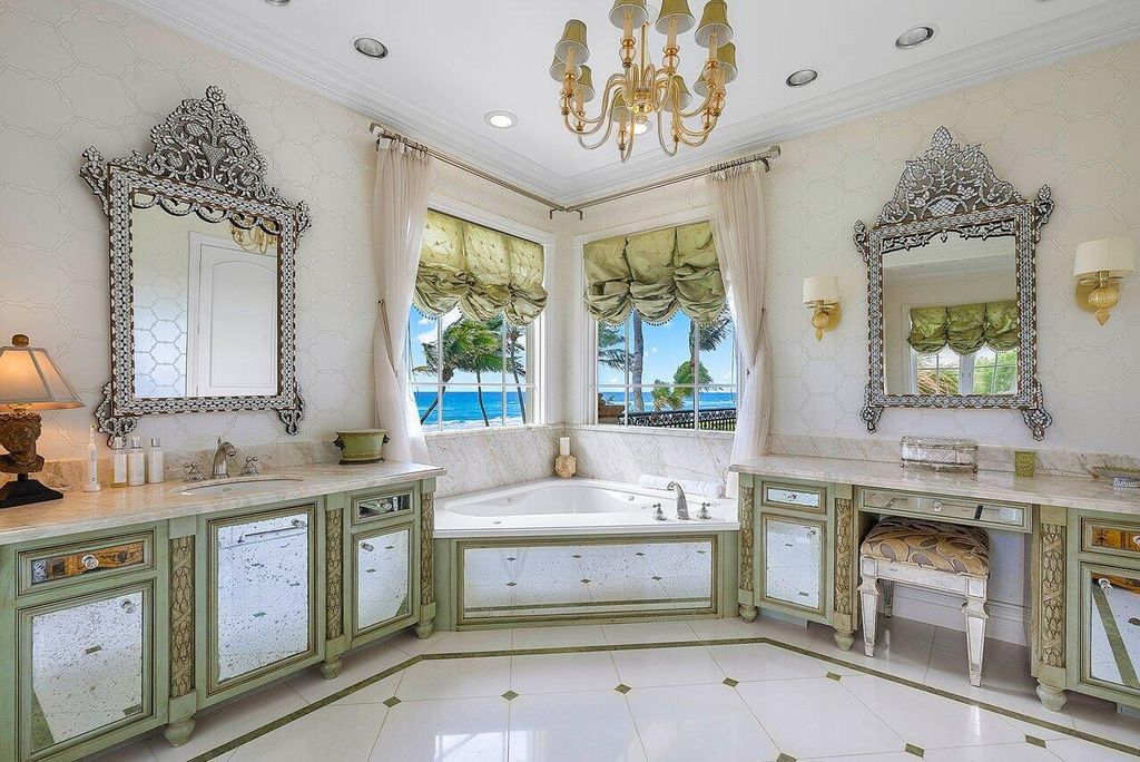 This exquisite estate, built by renowned Dan Swanson, offers breathtaking views of South Florida's coastline.