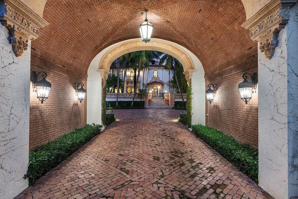 This exquisite estate, built by renowned Dan Swanson, offers breathtaking views of South Florida's coastline.