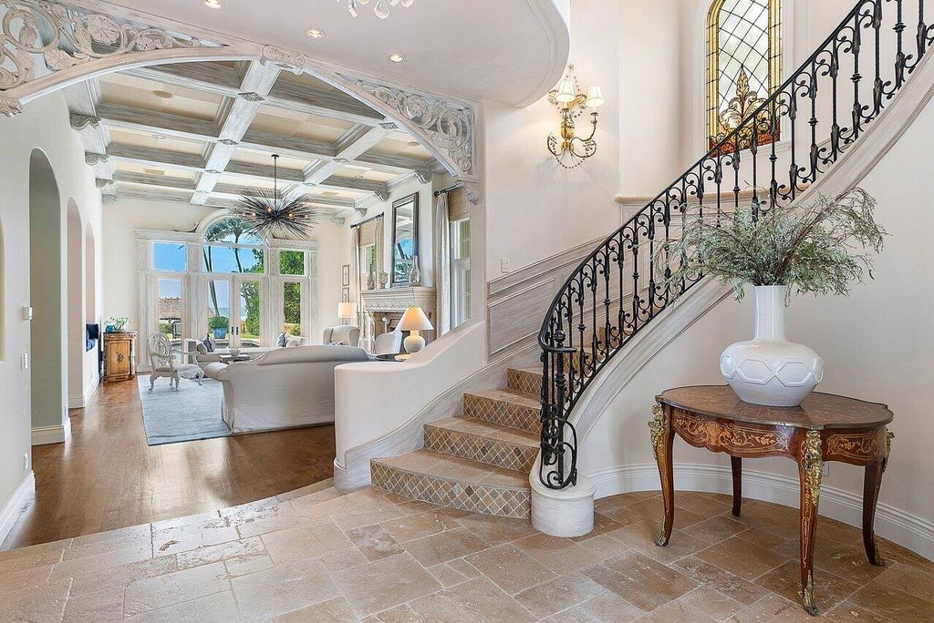 This exquisite estate, built by renowned Dan Swanson, offers breathtaking views of South Florida's coastline.