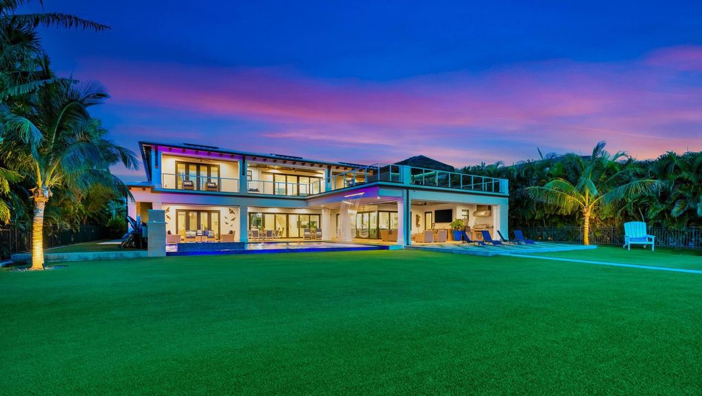 Designed by Dennis Rainho and built in 2023 by Tony Hernandez, this residence features 5 bedrooms, 9 bathrooms, and 8,179 square feet of living space on a 3/4-acre lot.