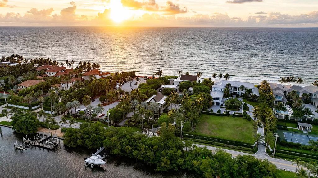This 6-bed, 6-bath home features a soaring great room with ocean views, a fabulous new chef's kitchen, a guest house, and a resort-style outdoor oasis complete with an infinity pool, koi pond with fountain, and Intracoastal dock