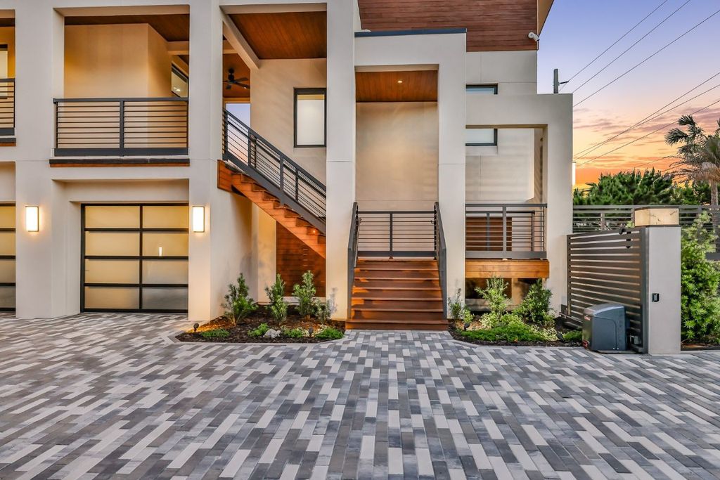 Located at 4330 S Fletcher Ave, this modern masterpiece, designed by John Cotner, offers California luxury and East Coast sophistication.