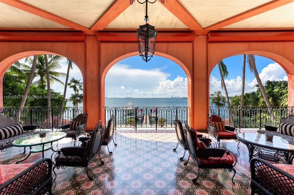 This extraordinary 3-story chateau-like waterfront estate offers 6,240 square feet of refined living space, featuring 7 lavish bedrooms and 8 opulent bathrooms.