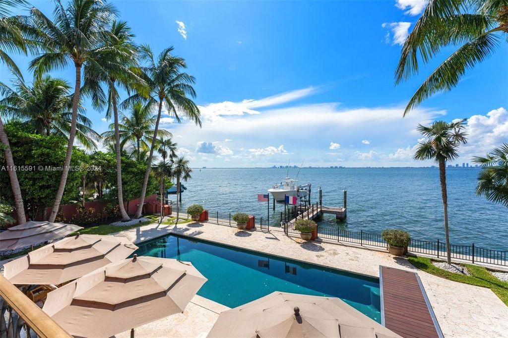 This extraordinary 3-story chateau-like waterfront estate offers 6,240 square feet of refined living space, featuring 7 lavish bedrooms and 8 opulent bathrooms.