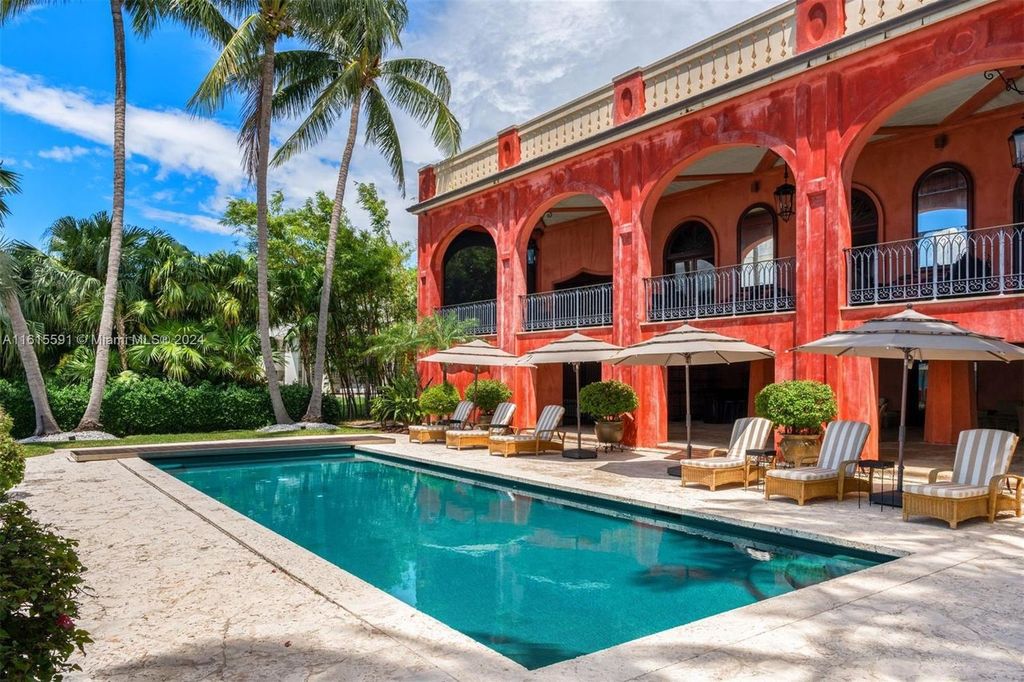 This extraordinary 3-story chateau-like waterfront estate offers 6,240 square feet of refined living space, featuring 7 lavish bedrooms and 8 opulent bathrooms.