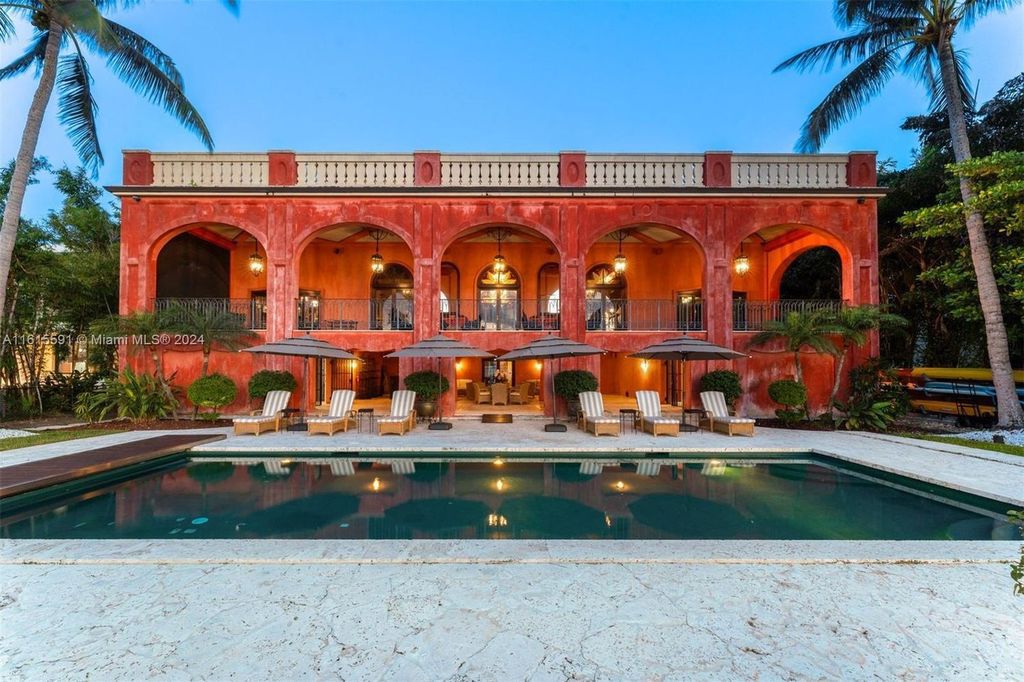 This extraordinary 3-story chateau-like waterfront estate offers 6,240 square feet of refined living space, featuring 7 lavish bedrooms and 8 opulent bathrooms.