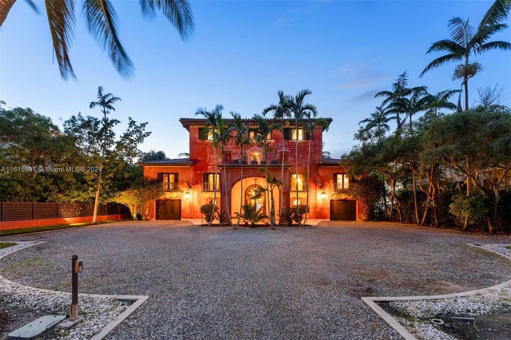 This extraordinary 3-story chateau-like waterfront estate offers 6,240 square feet of refined living space, featuring 7 lavish bedrooms and 8 opulent bathrooms.