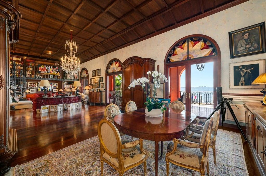 This extraordinary 3-story chateau-like waterfront estate offers 6,240 square feet of refined living space, featuring 7 lavish bedrooms and 8 opulent bathrooms.