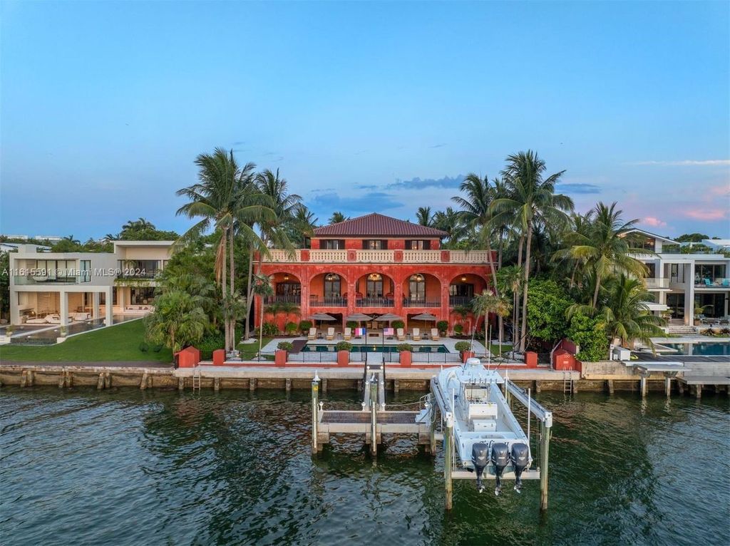 This extraordinary 3-story chateau-like waterfront estate offers 6,240 square feet of refined living space, featuring 7 lavish bedrooms and 8 opulent bathrooms.