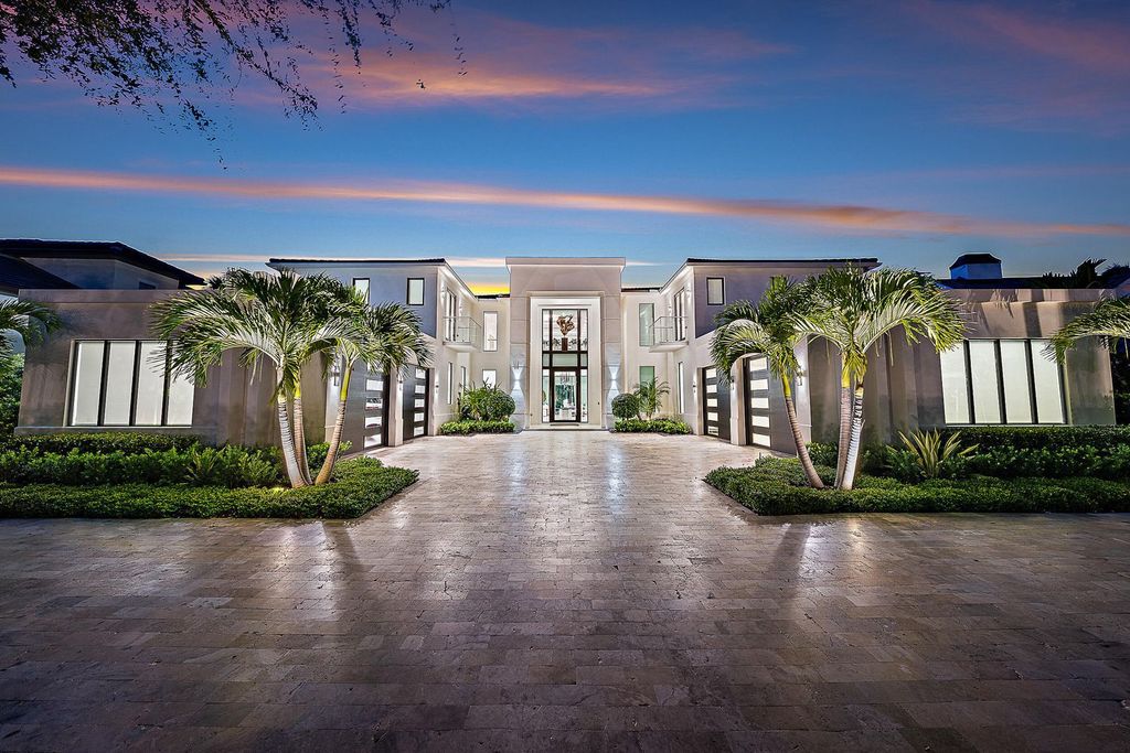 Discover the pinnacle of coastal luxury in this brand-new, open-concept transitional estate at 114 Quayside Dr, located within the prestigious Admirals Cove community in Jupiter, FL.