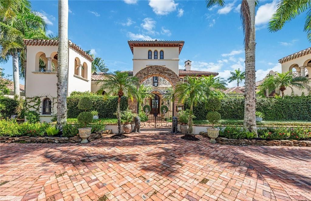 Welcome to Villa Groveland, a stunning Italian-inspired home in Quail West with breathtaking golf and lake views.