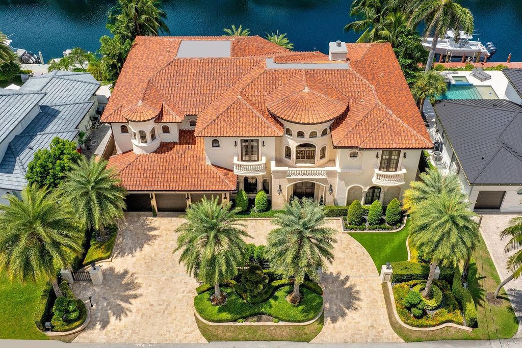 This stunning $7 million waterfront estate features 5 bedrooms, 5.1 bathrooms, breathtaking water views, and direct ocean access.