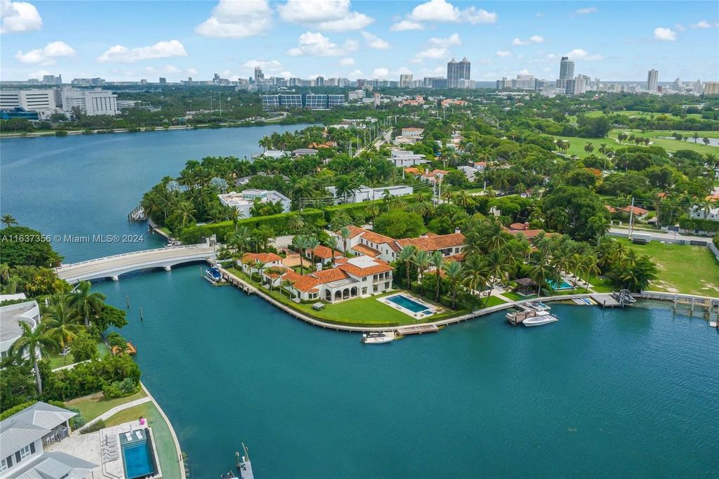 Perfectly nestled between prestigious North Bay Road and Sunset Island, this unique corner lot offers 325 feet of waterfrontage on Sunset Lake with breathtaking panoramic views.