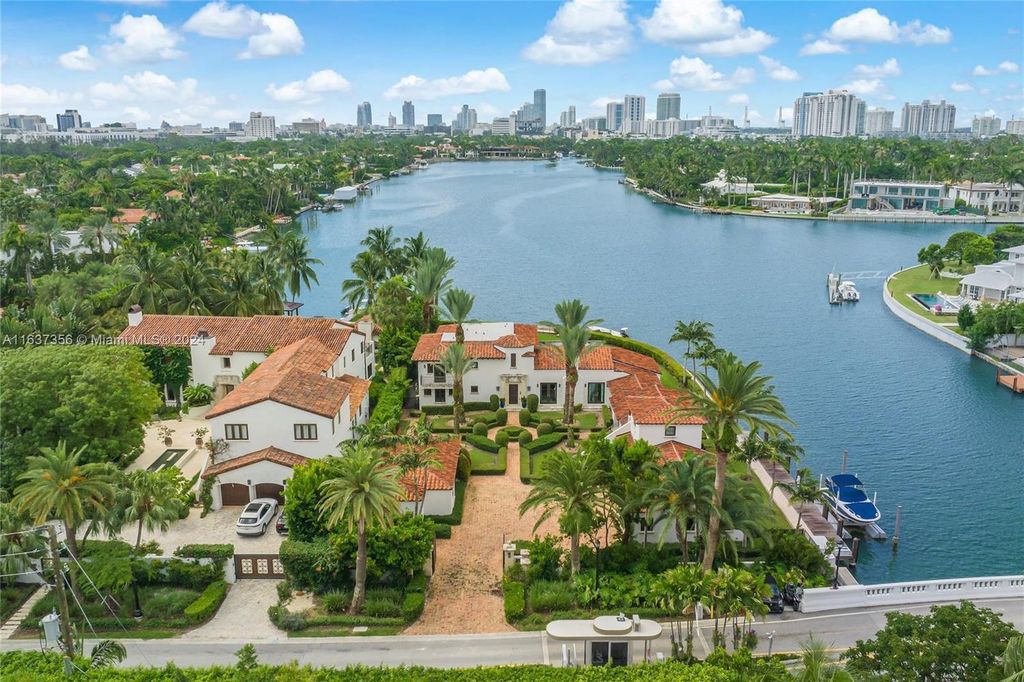 Perfectly nestled between prestigious North Bay Road and Sunset Island, this unique corner lot offers 325 feet of waterfrontage on Sunset Lake with breathtaking panoramic views.