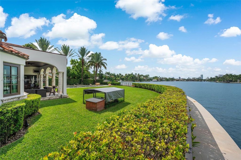 Perfectly nestled between prestigious North Bay Road and Sunset Island, this unique corner lot offers 325 feet of waterfrontage on Sunset Lake with breathtaking panoramic views.