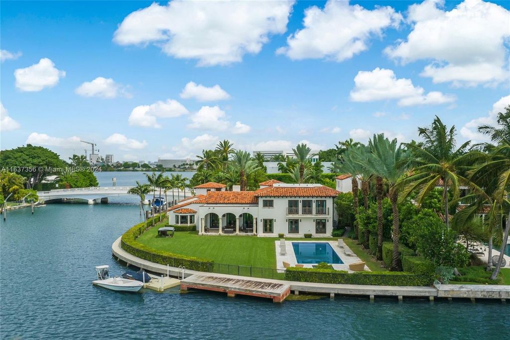 Perfectly nestled between prestigious North Bay Road and Sunset Island, this unique corner lot offers 325 feet of waterfrontage on Sunset Lake with breathtaking panoramic views.