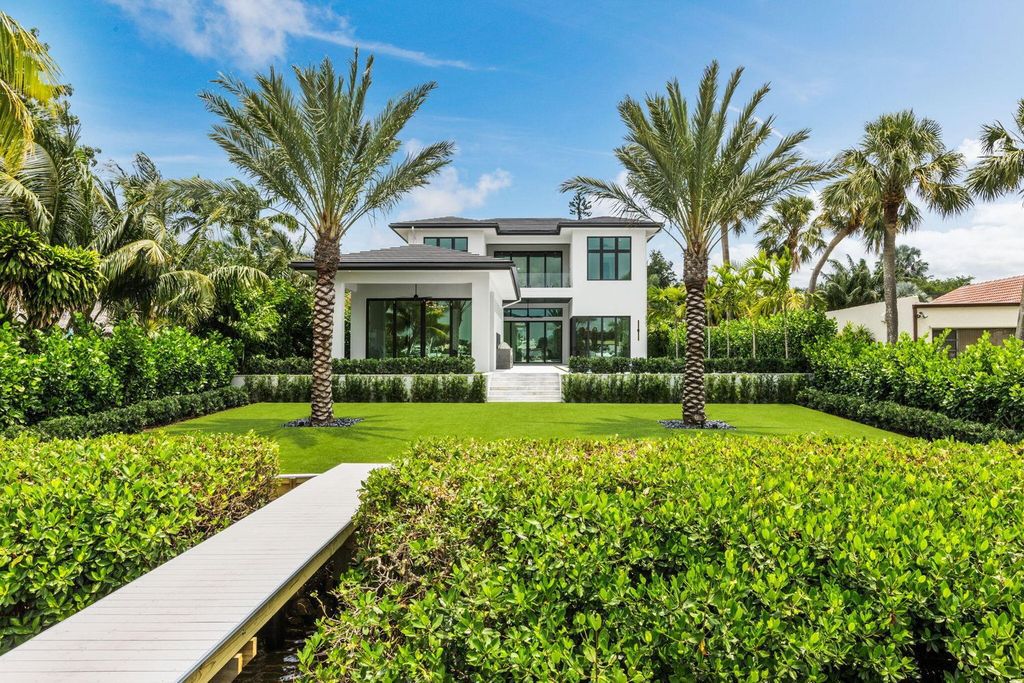 Discover unmatched luxury in this new, direct Intracoastal masterpiece on 0.63 acres.
