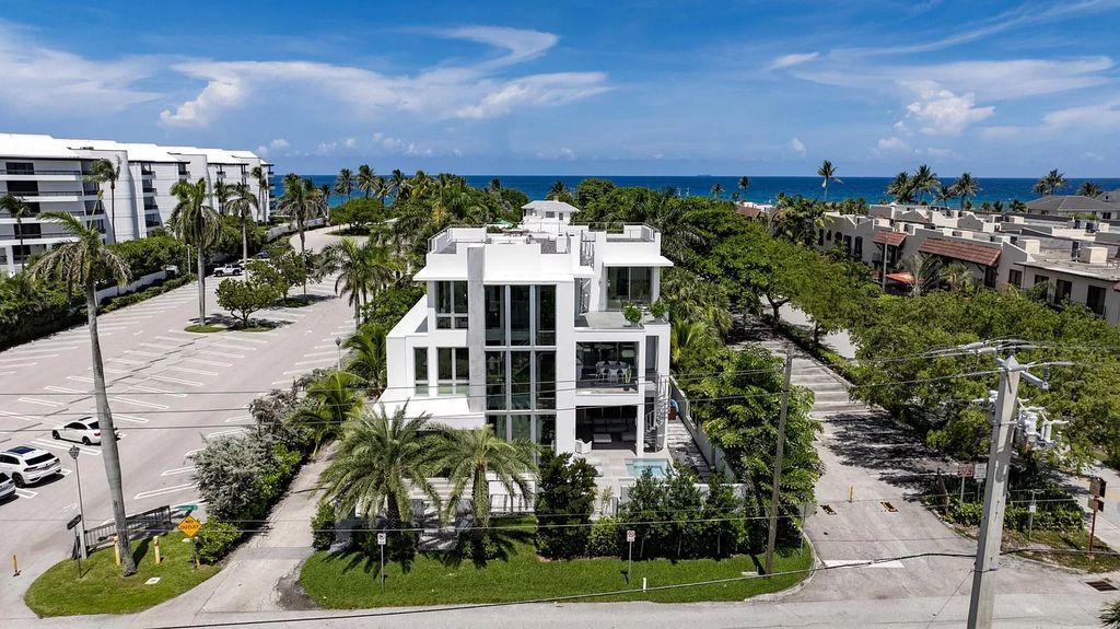 Just one block from the ocean, this 4-bed, 5-bath, 4,869 square feet residence features a Reina Sofia Museum-inspired glass-shaft elevator, balconies on each floor, and a roof terrace for an immersive coastal experience.