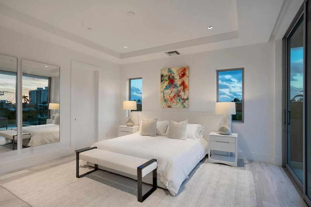 Just one block from the ocean, this 4-bed, 5-bath, 4,869 square feet residence features a Reina Sofia Museum-inspired glass-shaft elevator, balconies on each floor, and a roof terrace for an immersive coastal experience.