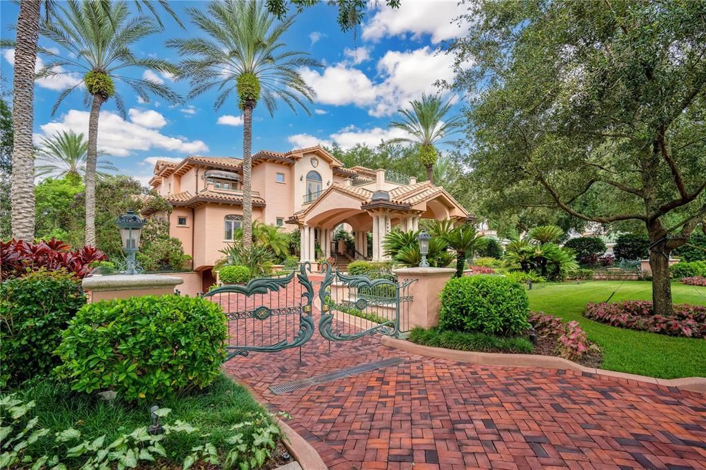 Welcome to "Puesta del Sol," a breathtaking 5-bed, 9-bath, 8,377 square feet lakefront estate in Isleworth, Windermere.