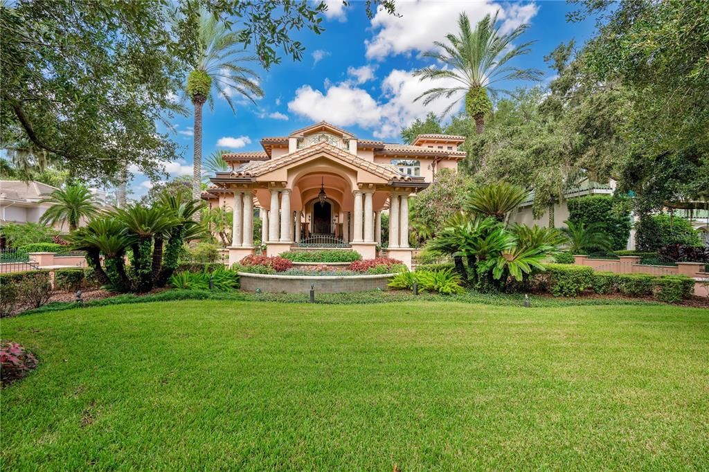 Welcome to "Puesta del Sol," a breathtaking 5-bed, 9-bath, 8,377 square feet lakefront estate in Isleworth, Windermere.