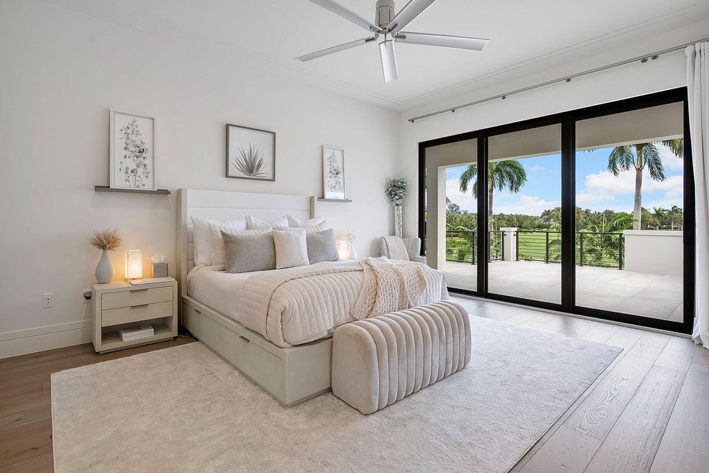 Offering 102 feet of prime golf course frontage, this contemporary 5-bedroom, 7-bath home boasts over 7,200 square feet of luxurious living space.