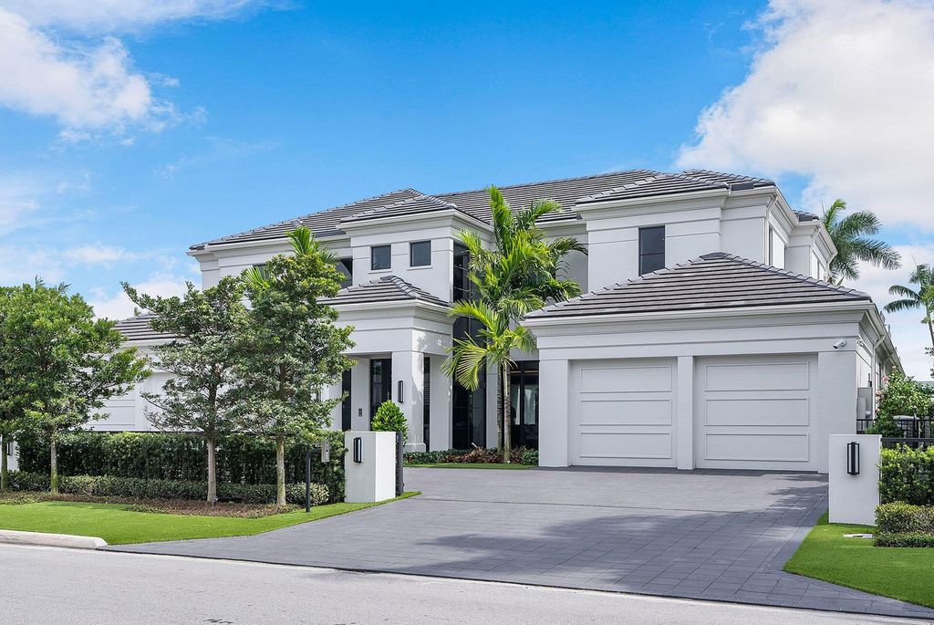 Offering 102 feet of prime golf course frontage, this contemporary 5-bedroom, 7-bath home boasts over 7,200 square feet of luxurious living space.