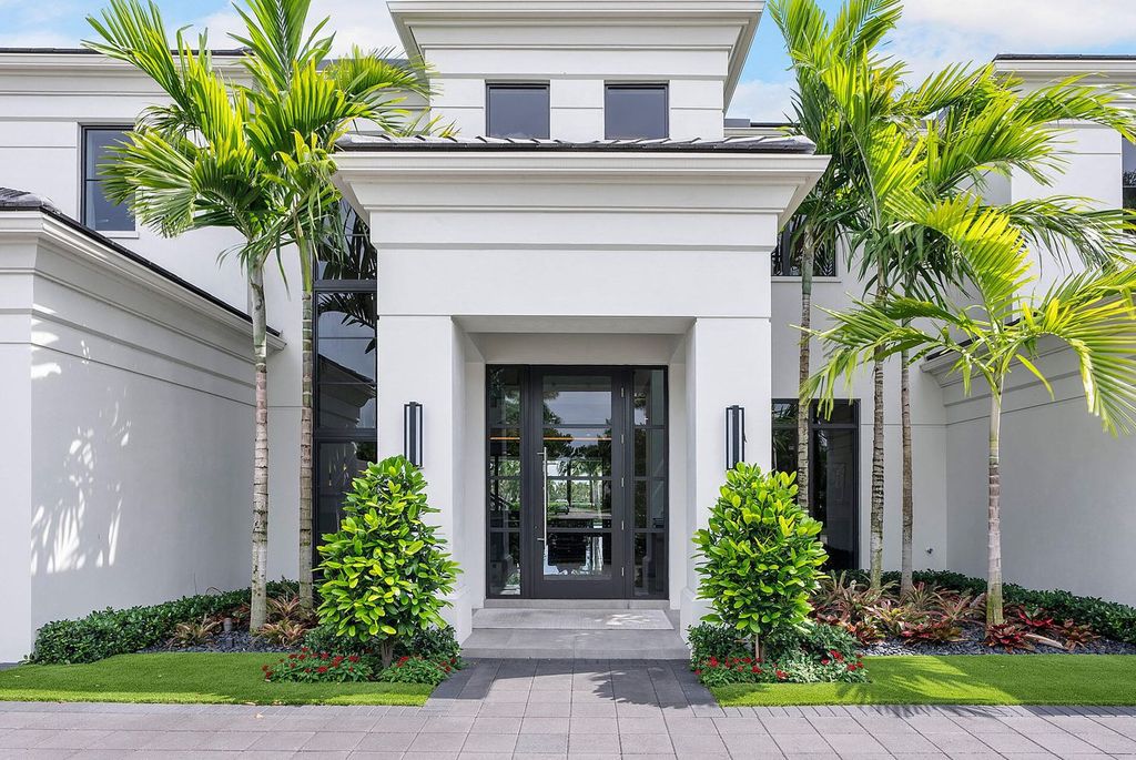 Offering 102 feet of prime golf course frontage, this contemporary 5-bedroom, 7-bath home boasts over 7,200 square feet of luxurious living space.