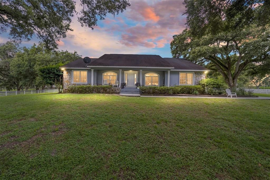 This 10,000 square feet main residence features 8 bedrooms, including separate caretaker's quarters, and boasts a grand foyer with 20-foot ceilings, a gourmet kitchen, and ample entertainment space.