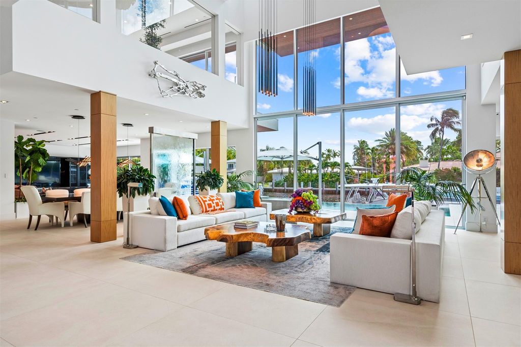 Experience the pinnacle of luxury living at this stunning contemporary estate, located in the prestigious guard-gated Harbor Beach community.