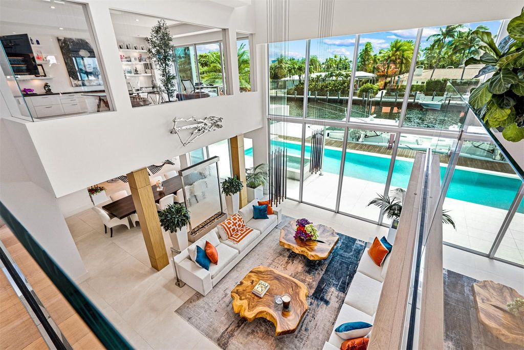 Experience the pinnacle of luxury living at this stunning contemporary estate, located in the prestigious guard-gated Harbor Beach community.