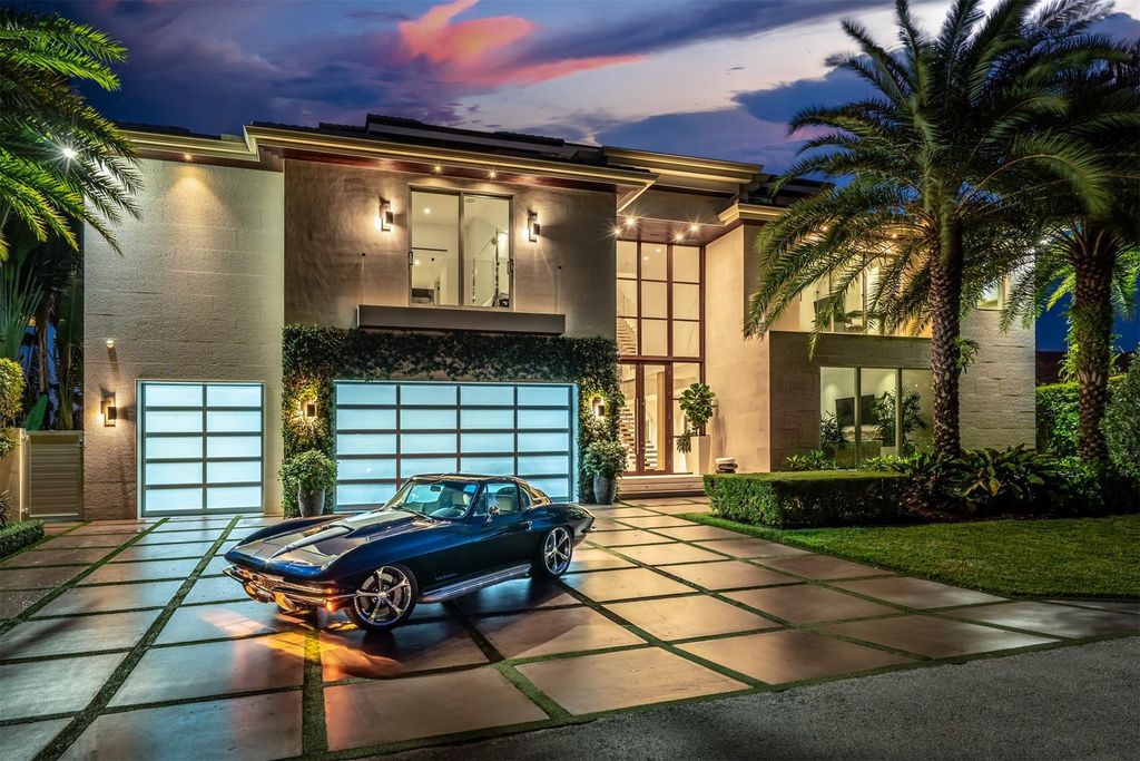 Experience the pinnacle of luxury living at this stunning contemporary estate, located in the prestigious guard-gated Harbor Beach community.