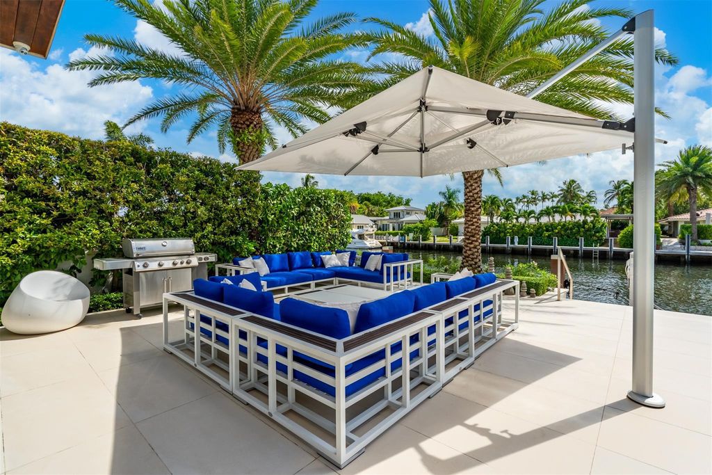 Experience the pinnacle of luxury living at this stunning contemporary estate, located in the prestigious guard-gated Harbor Beach community.