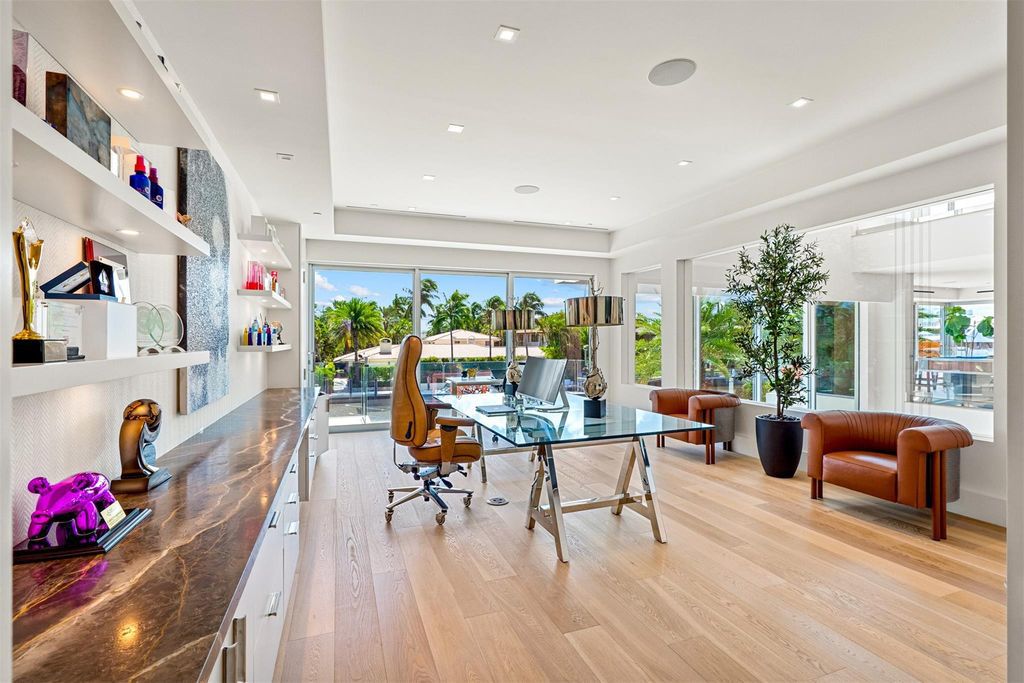 Experience the pinnacle of luxury living at this stunning contemporary estate, located in the prestigious guard-gated Harbor Beach community.