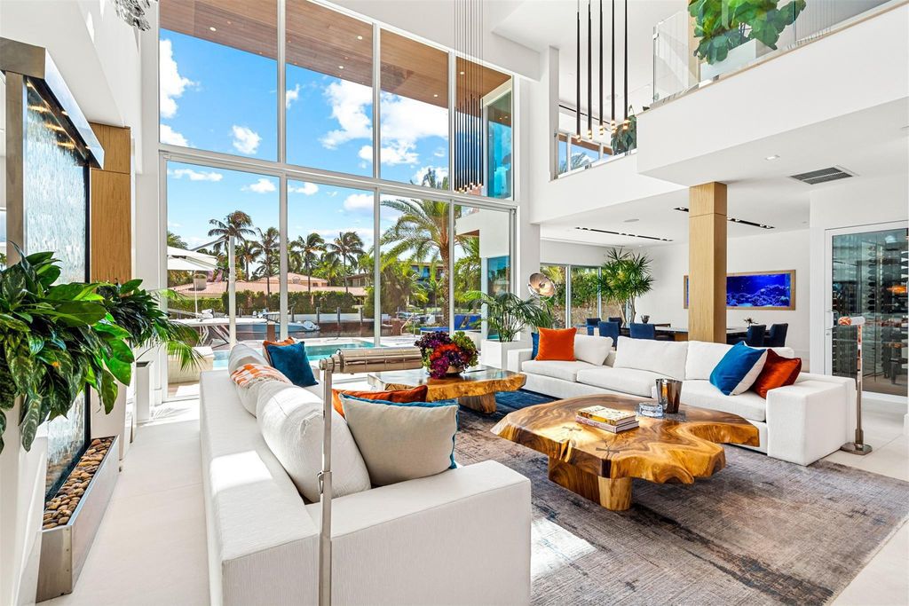 Experience the pinnacle of luxury living at this stunning contemporary estate, located in the prestigious guard-gated Harbor Beach community.