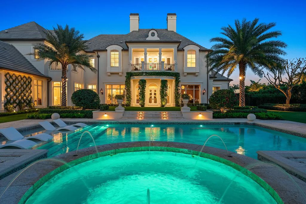 Set on a 1.09-acre lot, this 5-bedroom, 8,589-sf home in the sought-after Old Palm Golf Club combines timeless European design with modern upgrades.