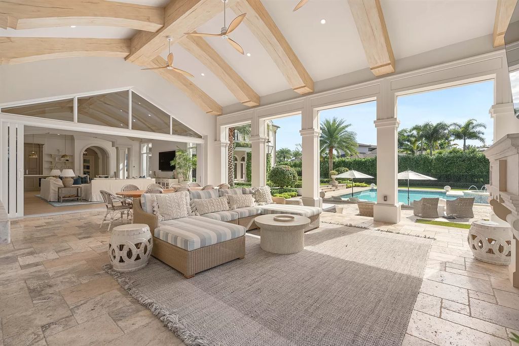 Set on a 1.09-acre lot, this 5-bedroom, 8,589-sf home in the sought-after Old Palm Golf Club combines timeless European design with modern upgrades.