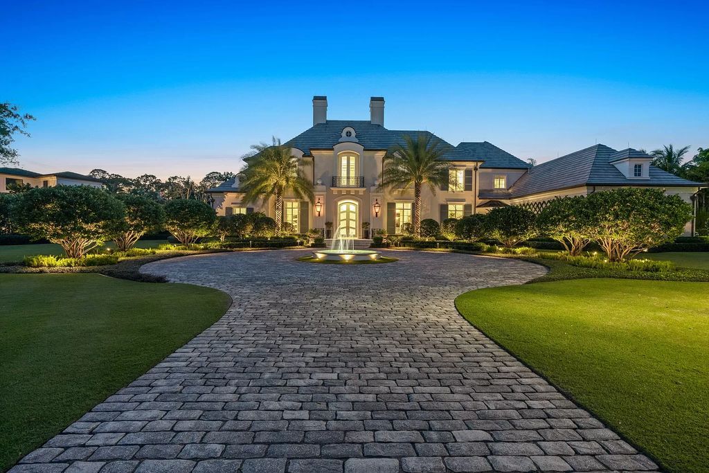 Set on a 1.09-acre lot, this 5-bedroom, 8,589-sf home in the sought-after Old Palm Golf Club combines timeless European design with modern upgrades.