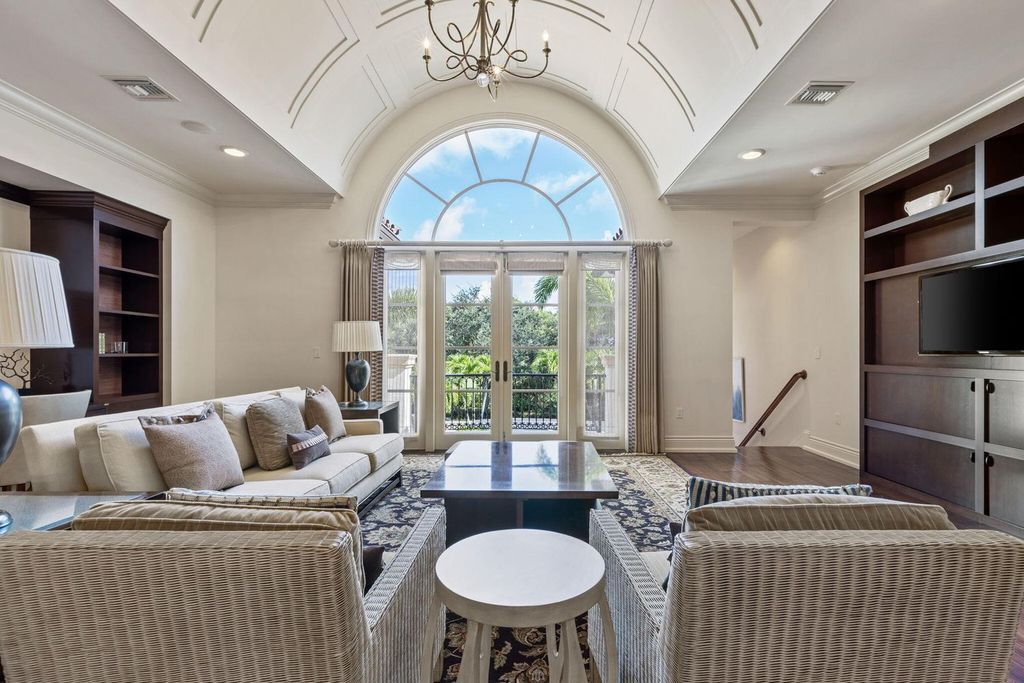 Crafted by renowned builder Lavelle Construction in 2010, this timeless estate spans nearly 10,000 square feet of luxurious living space and is set on a generous 1.1-acre lot, overlooking the 15th fairway.