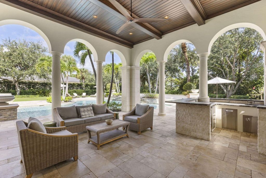 Crafted by renowned builder Lavelle Construction in 2010, this timeless estate spans nearly 10,000 square feet of luxurious living space and is set on a generous 1.1-acre lot, overlooking the 15th fairway.