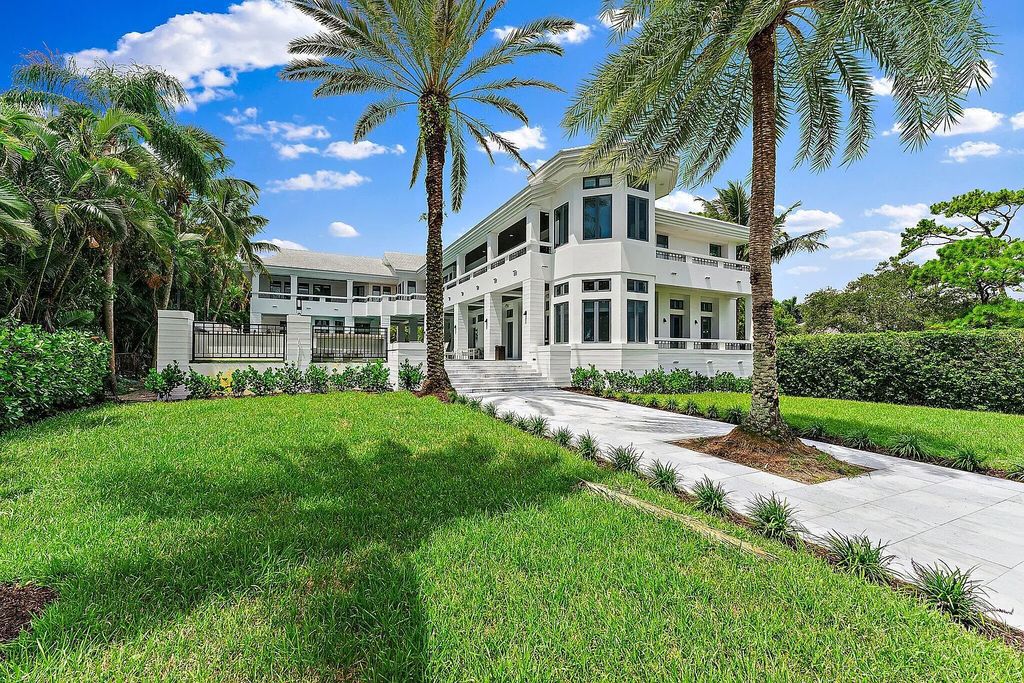 Featuring 8 bedrooms, 13 baths, and 9,306 square feet of space, this 1.55-acre property is ideal for boating enthusiasts.