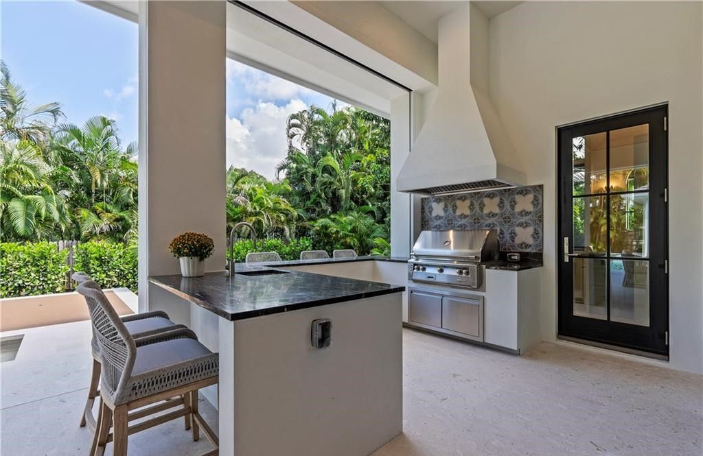 Discover this newly completed, fully furnished 4-bedroom, 4.5-bath home in Coquina Sands, just minutes from Gulf beaches and the future Four Seasons Resort.