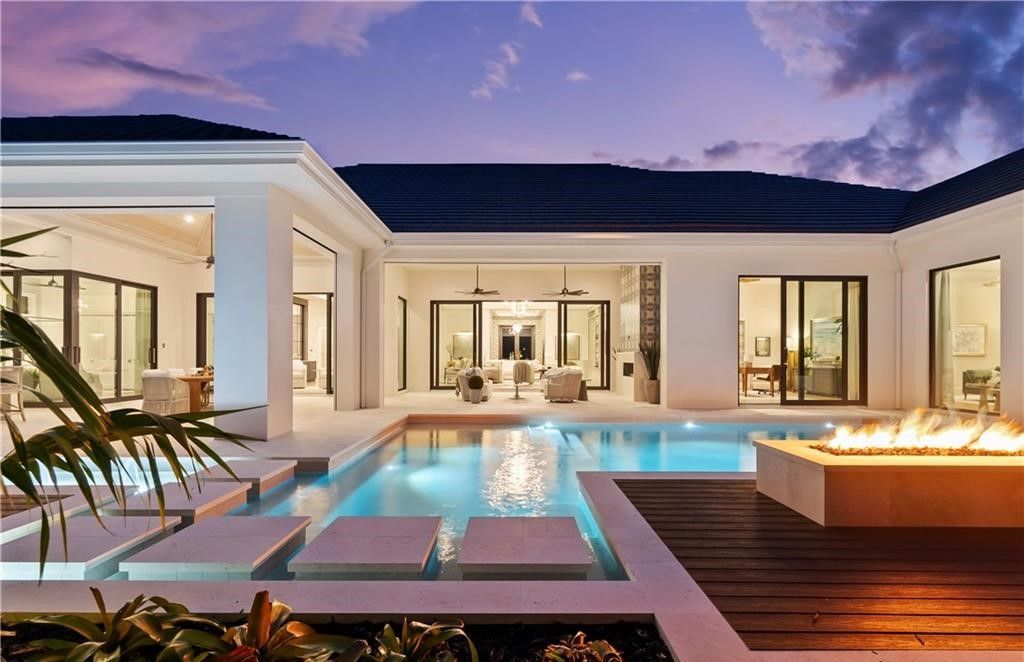 Discover this newly completed, fully furnished 4-bedroom, 4.5-bath home in Coquina Sands, just minutes from Gulf beaches and the future Four Seasons Resort.