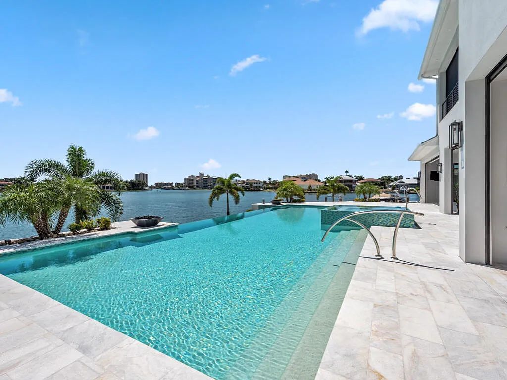 $13.9 Million Spectacular Custom-Built Home with Expansive Outdoor Living and Breathtaking Bay Views in Marco Island