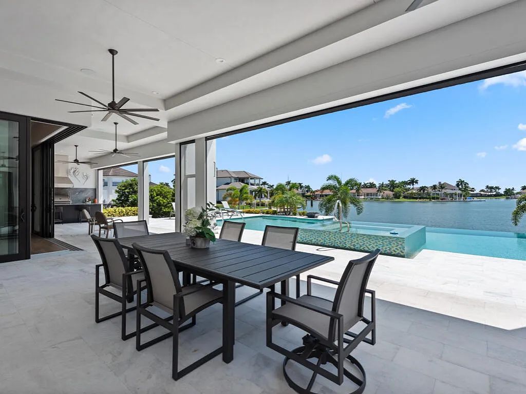 $13.9 Million Spectacular Custom-Built Home with Expansive Outdoor Living and Breathtaking Bay Views in Marco Island